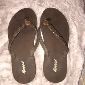 Brown flip flops